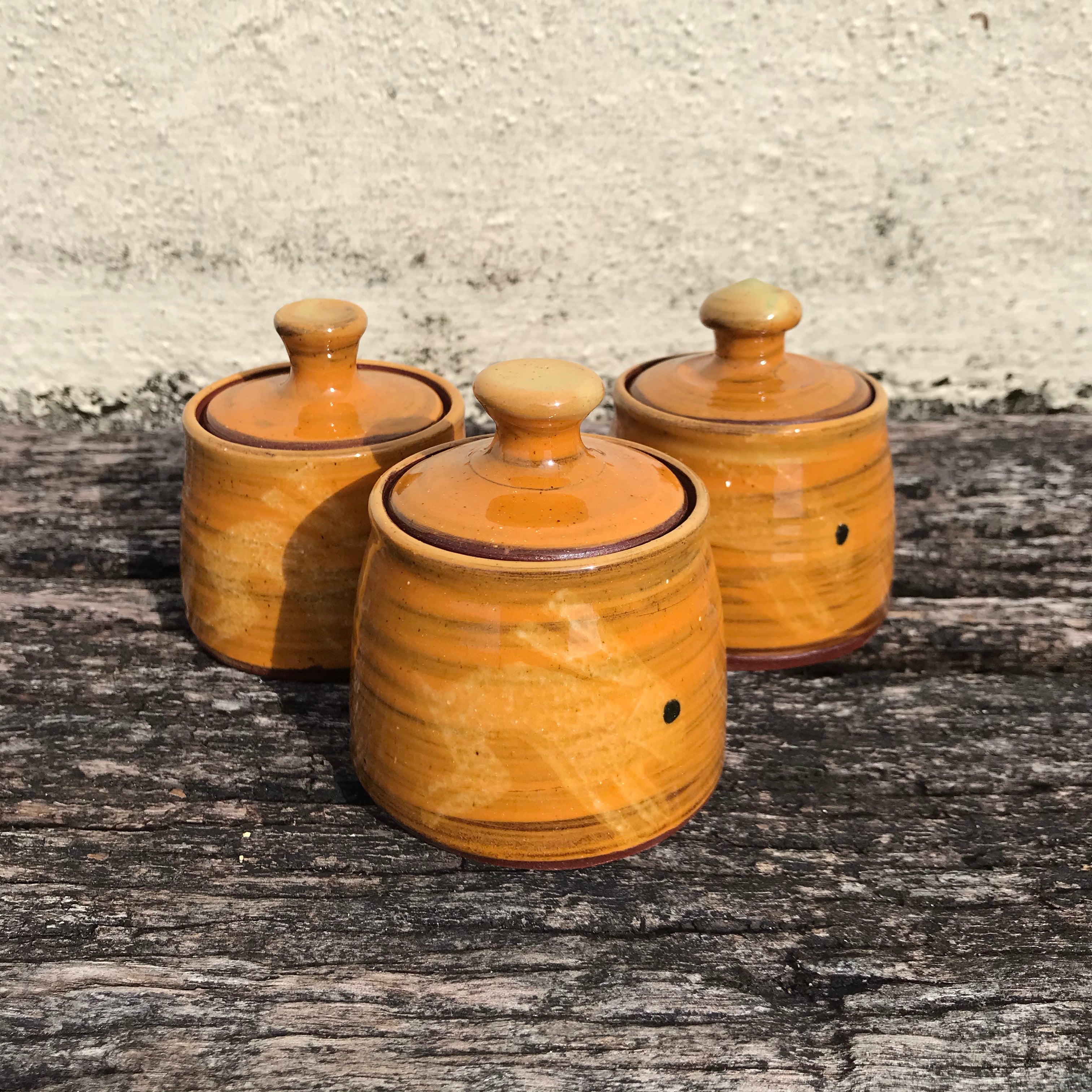 Orange lidded Pot with Hares